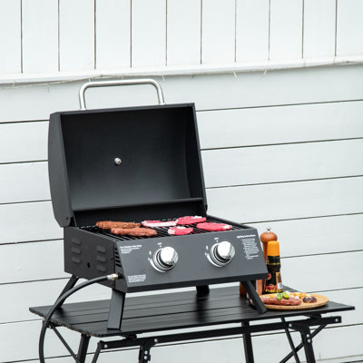 Barbecue au propane à 2 brûleurs, extérieur portatif. Pieds pliables, couvercle avec fonction fumée, thermomètre. Noir, idéal pour le camping, le pique-nique, le gaz portatif, le propane. Rangement des pieds. Et parfait