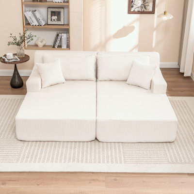 Canapé-lit rembourré avec coussin et coussins moelleux