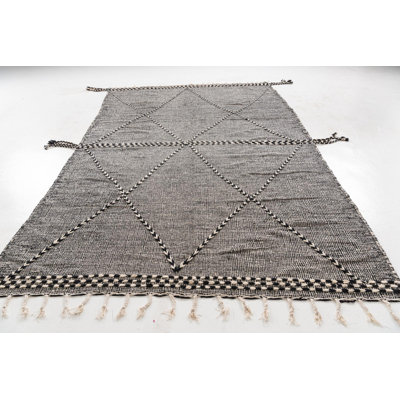 Tapis noir et blanc Orpheus