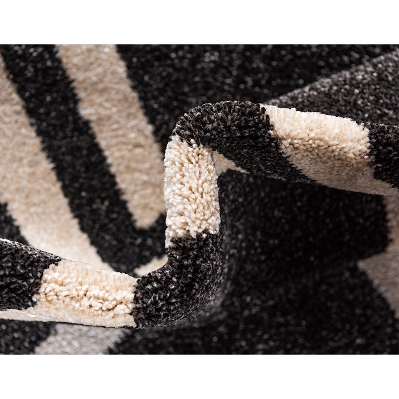 Tapis noir / beige à motif géométrique Soliana, Rond 8 pi