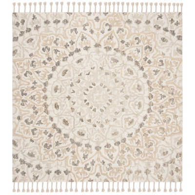 Jahiem Floral Handwoven Wool Area Rug in Ivory/Taupe