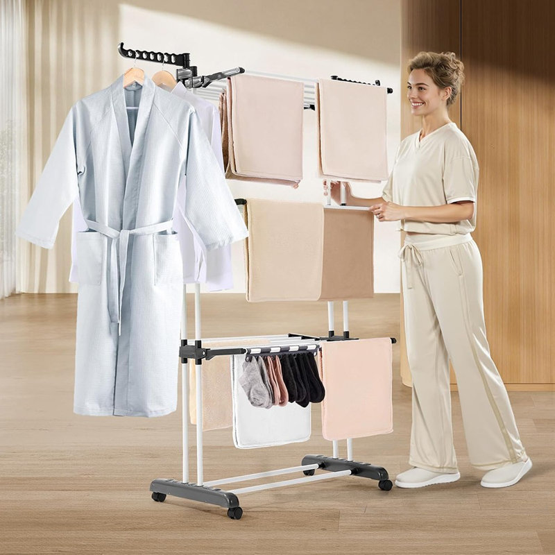 Séchoir à linge pliable à 4 niveaux, support à linge en métal avec ailes latérales, cintre portatif autoportant avec roulettes, style utilitaire intérieur et extérieur