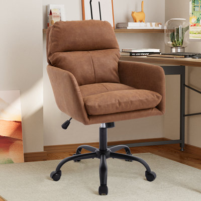 Cuir artificiel, cuir synthétique, base noire, hauteur réglable, convient au bureau, à la chambre à coucher, à la coiffeuse et à d'autres environnements. Une chaise de bureau.