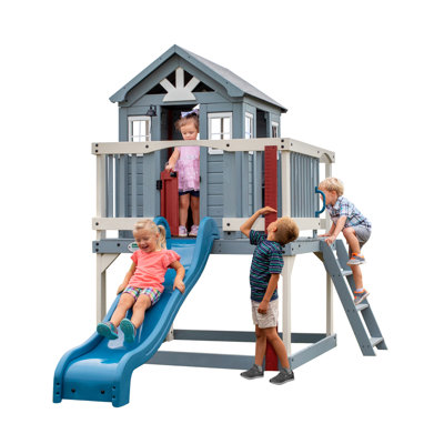 Backyard Discovery Beacon Heights Cedar Wooden Elevated Kids Playhouse with Wave Slide, Play Kitchen, and Deck