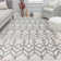 Ildiko Knox Tribal Candle White Area Rug