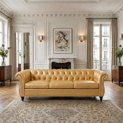 Canapé Chesterfield 3 places avec accoudoirs roulés