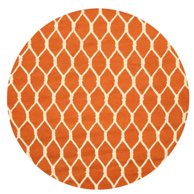 Tapis orange en laine touffeté à motif géométrique