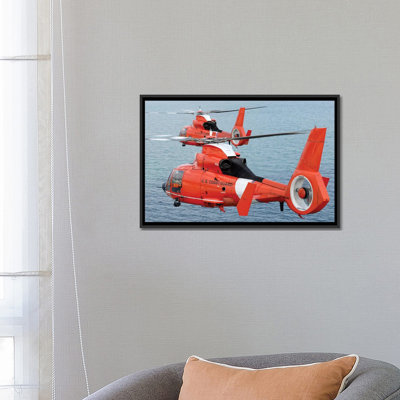 " Two Coast Guard HH-65C Dolphin Helicopters Fly In Formation Over The Atlantic Ocean " by Stocktrek Images