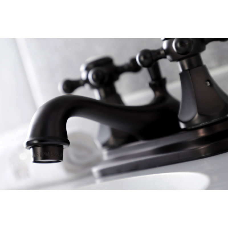 Kingston Brass Metropolitan Two-Handle 3-Hole Deck Mount 4" Centerset Bathroom Faucet with Plastic Pop-Up, Oil Rubbed Bronze