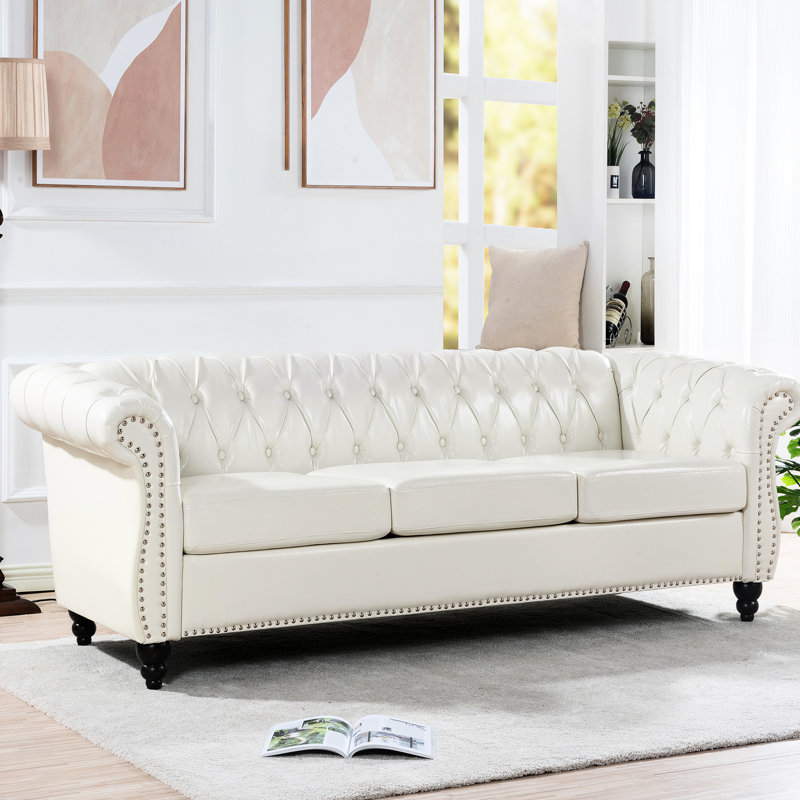 Canapé 3 places blanc de 211,8 cm (83,28 po), revêtement en similicuir, rembourrage en mousse, structure en bois massif et contreplaqué, pieds stables en bouleau avec accoudoirs arrondis, assise longue, revêtement en similicuir, rembourrage et structure, peinture vernie
