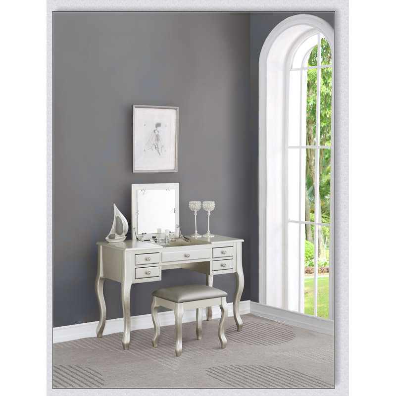 Ensemble de coiffeuse classique avec tabouret, tiroirs, miroir ouvert et pieds uniques pour l'élégance et le rangement de la chambre à coucher