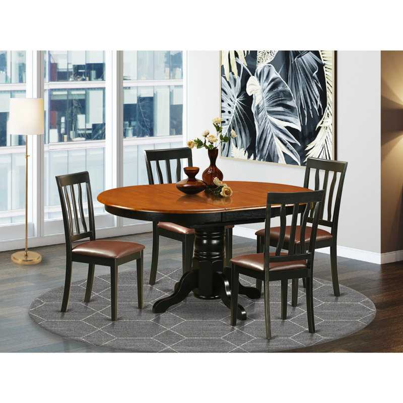 L'ensemble de table de salle à manger 5 pièces pour 4 personnes comprend une table de cuisine ovale avec rallonge papillon et 4 chaises de cuisine en similicuir, noir et cerise