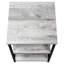 Table de chambre en stratifié gris avec support en métal noir pour un style contemporain. Construction robuste et durable. Accessoire idéal pour les petits travaux.