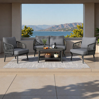 Ensemble de mobilier d'extérieur 4 pièces, chaises en métal avec dossier en forme de U en corde tissée, ensemble de conversation avec coussins épais et table basse pour le jardin