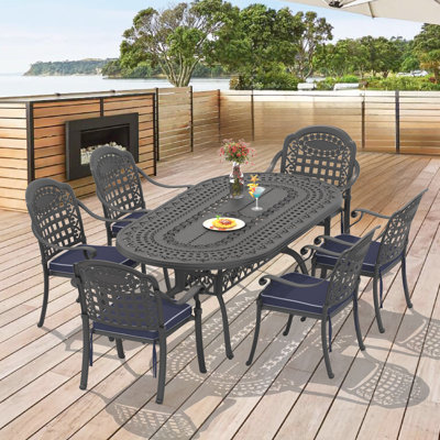 7-Piece Patio Cast Aluminum Dining Set, 81.89"L Oval Table with Umbrella Hole & 6 Stackable Chairs, Blue Cushions