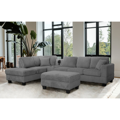 Vega Reversible Faux Fur Sectional with Media Console And Storage Ottoman