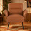 Fauteuil d'appoint contemporain avec pieds en métal noir et revêtement en similicuir, idéal pour les intérieurs modernes et offrant une assise confortable.-256446567