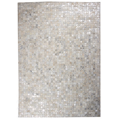 Tapis argenté en peau de vache Meer