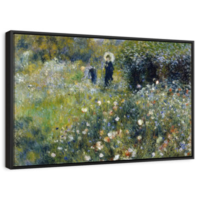 Femme avec un parasol dans un jardin
