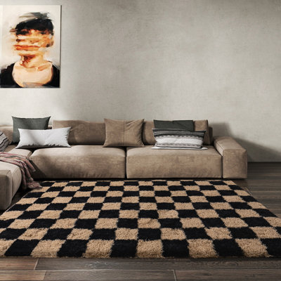 Black and camel-colored checkered area rug for indoor use, suitable for living rooms, bedrooms, and children's rooms.