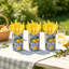Porte-ustensiles de style méditerranéen à carreaux bleu citron et couverts jaunes jetables pour les décorations de fêtes d'été et les centres de table de mariage