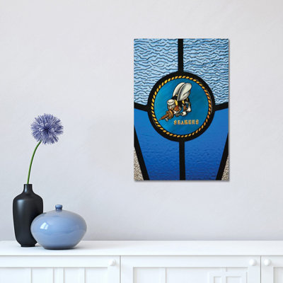 A Single Seabee Logo Built Into A Stained-Glass Window by Stocktrek Images - Wrapped Canvas Print