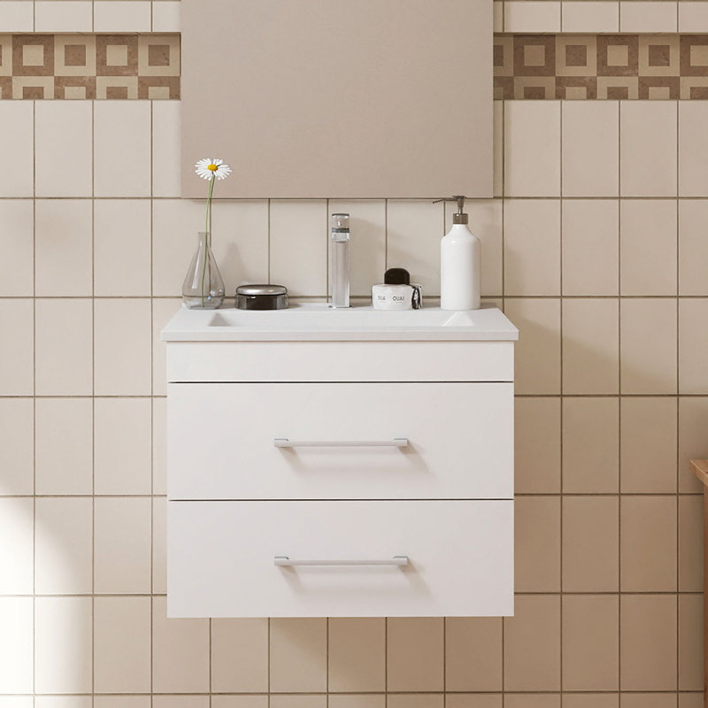 Le meuble-lavabo mural 24 po avec deux tiroirs, système de fermeture en douceur, lavabo en céramique, crée un espace de salle de bain moderne et minimaliste