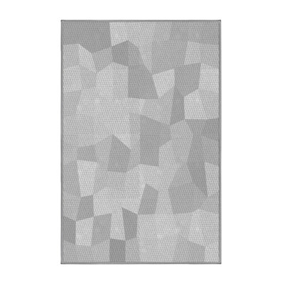 Tapis rond gris à motif géométrique