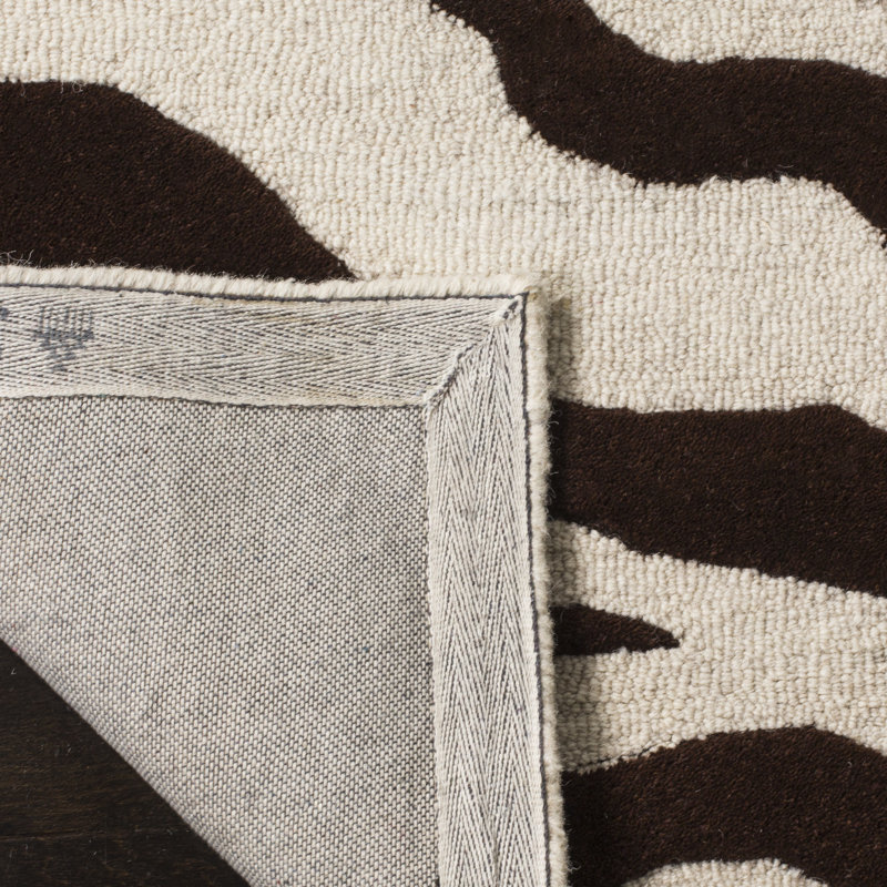 Schell Animal Print Wool Hand Tufted Area Rug, Rectangle 183 x 274 cm