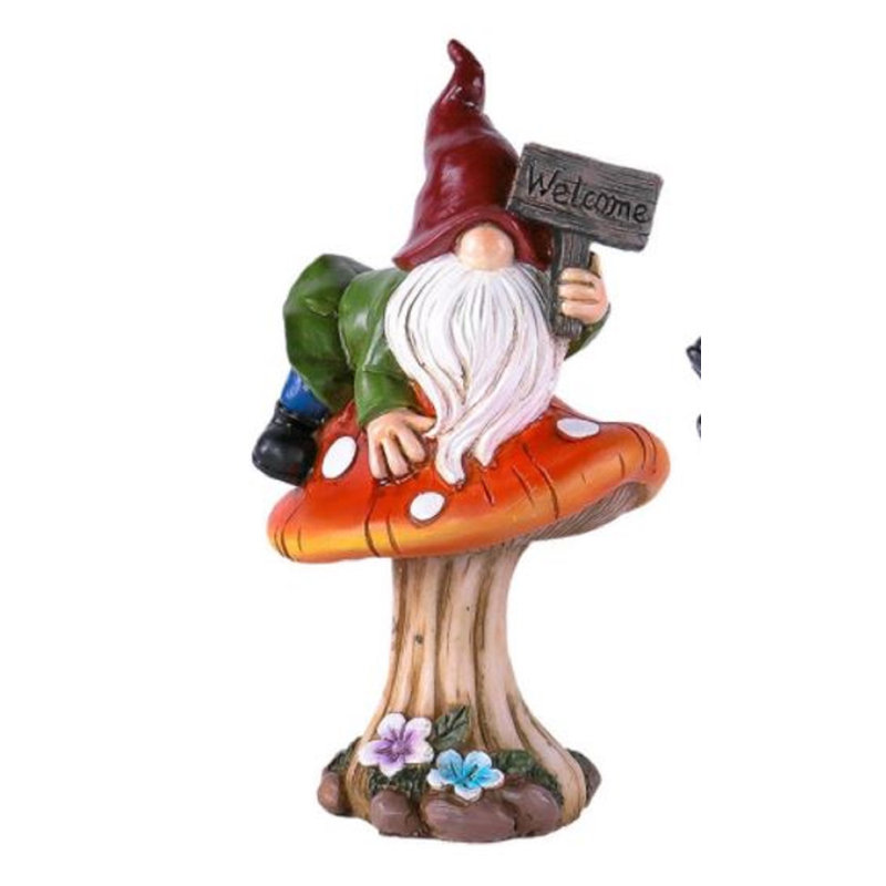 Statue gnome joye avec signe de bienvenue