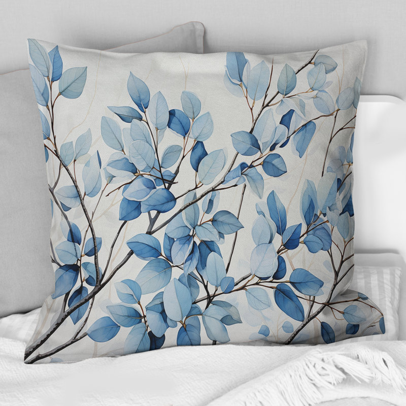 Coussin décoratif à motif de feuilles bleues et grises