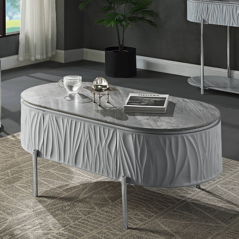 Table basse grise ultrabrillante et chrome