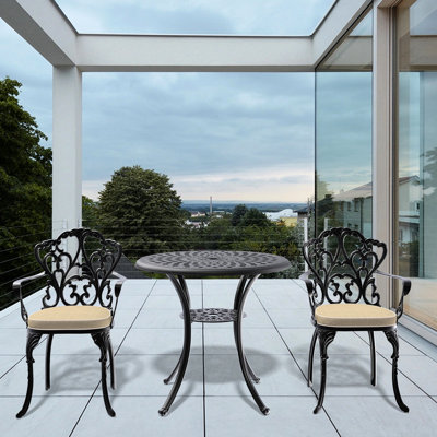 Patio noir en fonte d'aluminium avec chaises ergonomiques et coussins 2