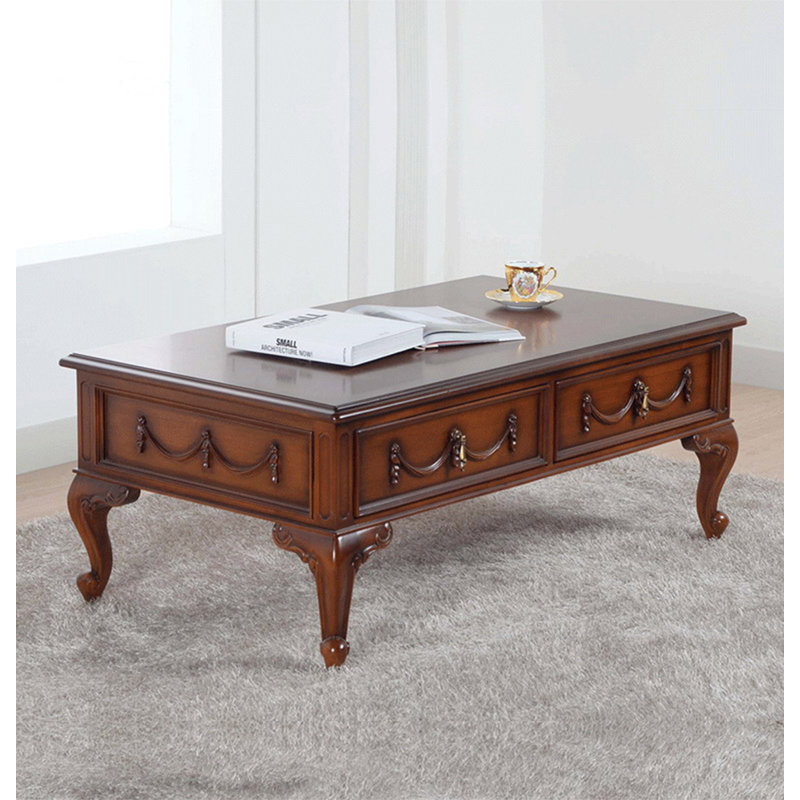 Carved mahogany coffee table