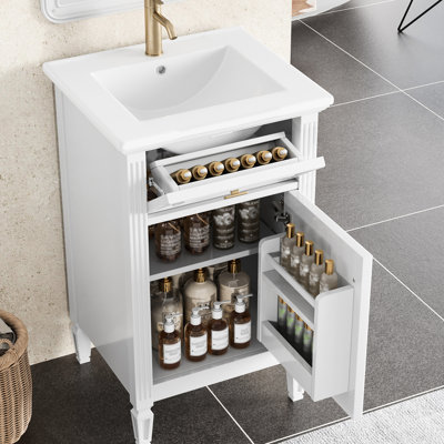 Meuble-lavabo blanc de 50 cm avec pieds en bois massif, tiroir inclinable et charnières à fermeture en douceur, idéal pour les petites salles de bain. Lavabo intégré, finis en métal doré, convient également aux invités.