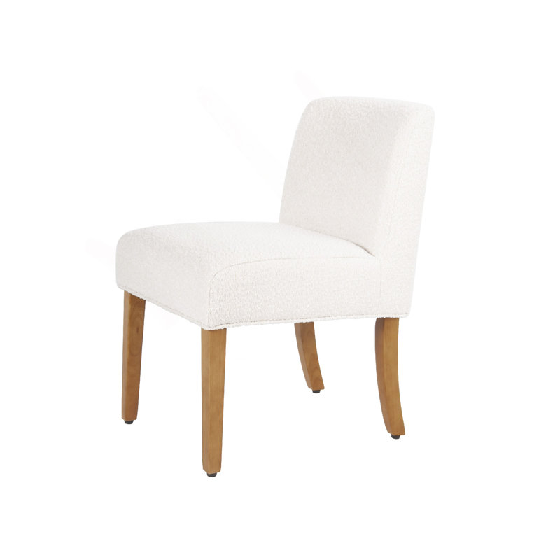Chaise de salle à manger Kip avec pieds en bois de chêne miel, tissu bouclé