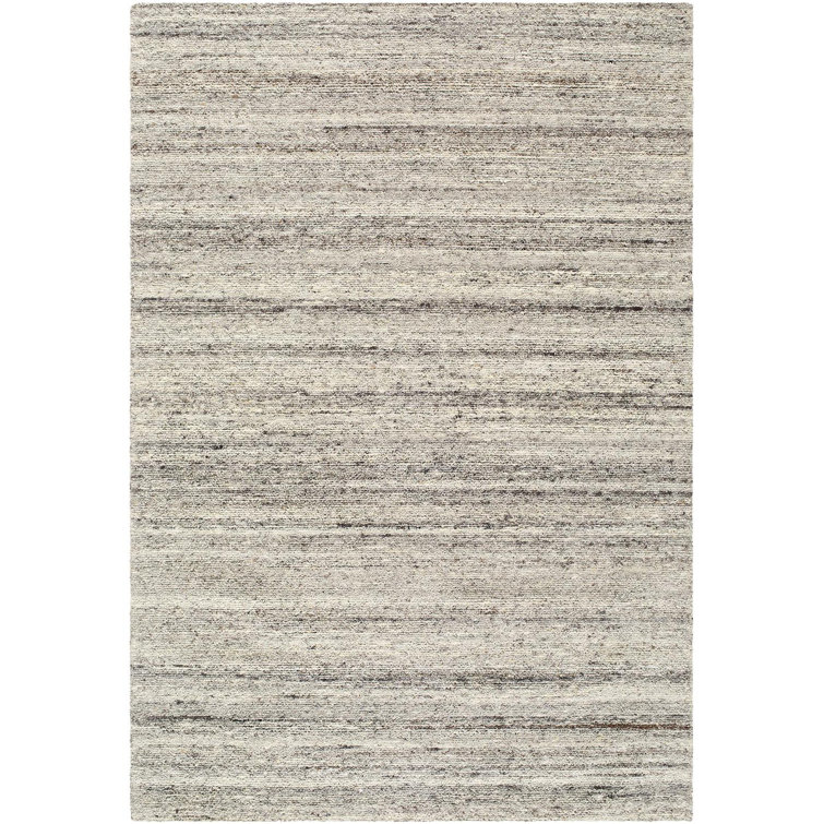 Isaak Hand Tufted Area Rug