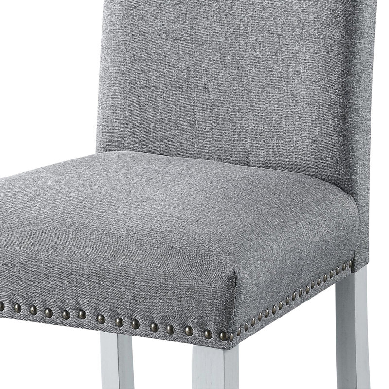 2 chaises en lin gris - pieds blanc antique pour une touche distincte, garniture cloutée élégante, système de ressorts hélicoïdaux