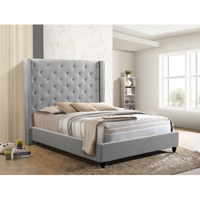Upholstered Wingback Bed