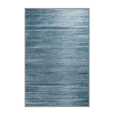 Tapis gris uni lavable à la machine