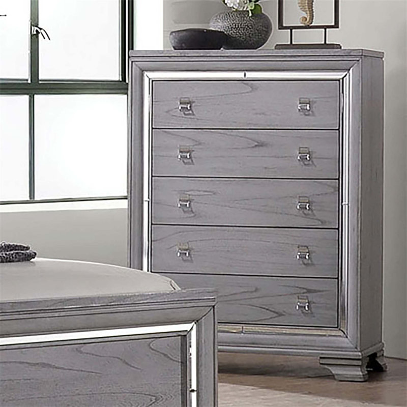 Commode de style contemporain avec cinq tiroirs en queue d'aronde, garniture de miroir et glissières à roulement à billes pour un rangement élégant