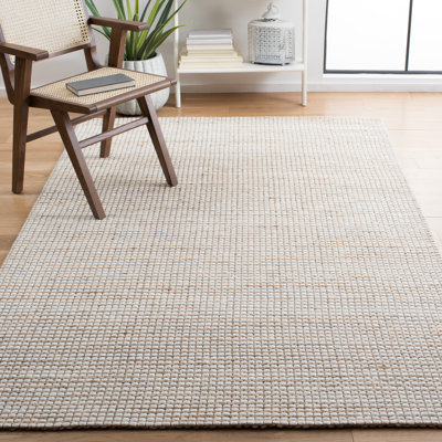 Atiyanna Handmade Tufted Natural/Ivory Area Rug