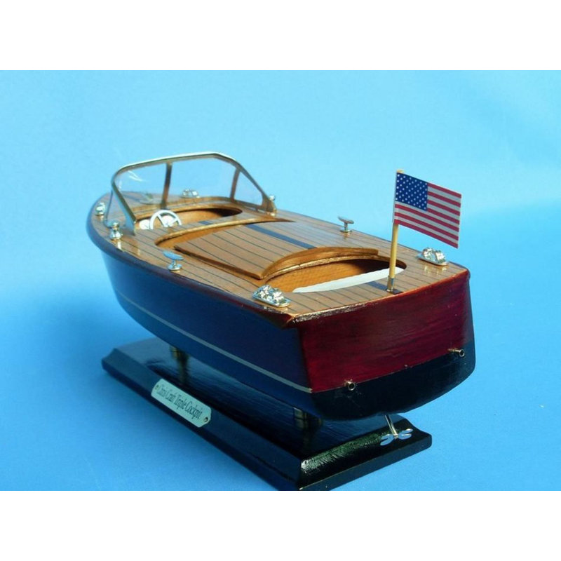 Bateau à trois cockpits en bois noir
