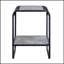 Table de bout Raziela en béton gris et noir avec rangement spacieux et assemblage facile, parfait pour les intérieurs modernes.