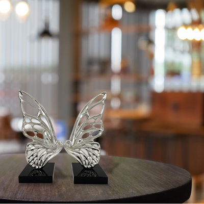 Sculpture papillon en résine chromée