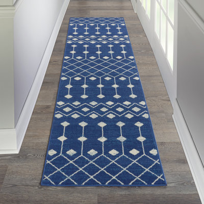 Tapis géométrique bleu marine / blanc Whanger