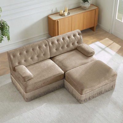 Canapé Chesterfield en L en velours respirant avec jupe à pampilles