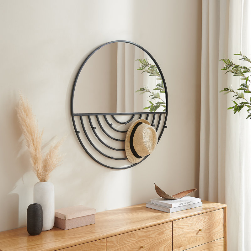 Miroir rond avec crochets à bijoux