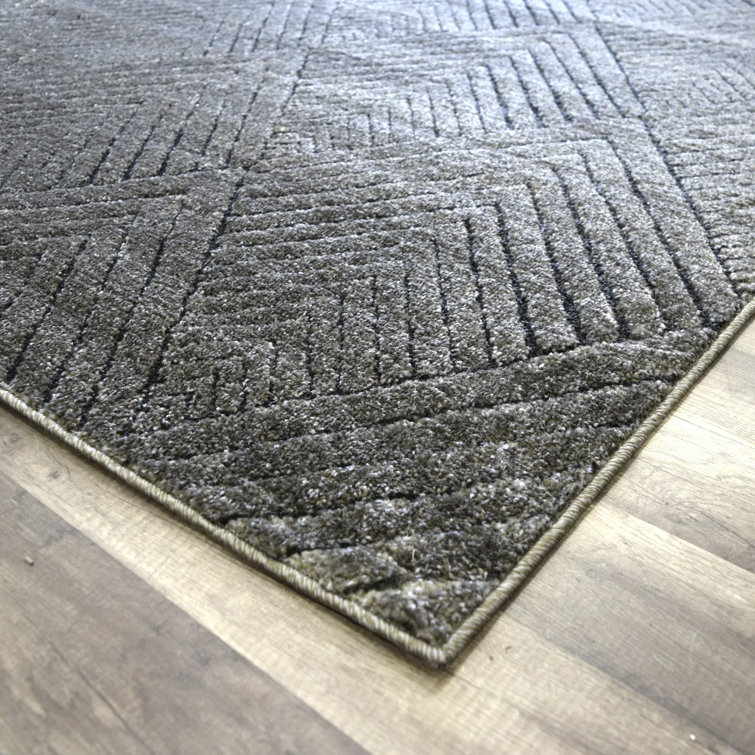 Tapis contemporain en carbone N Peace