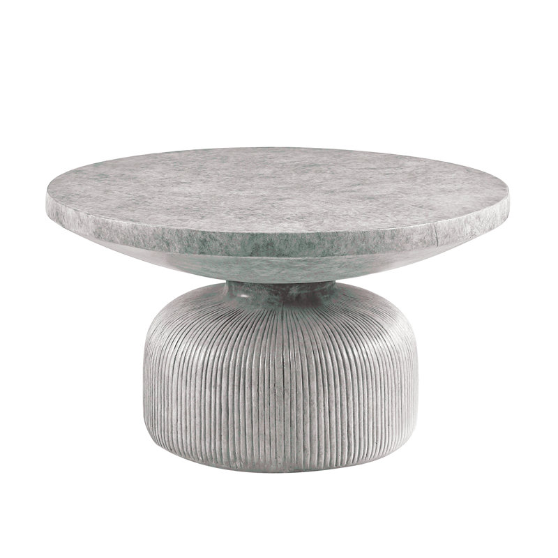 Table basse grise patinée avec plateau rond et base piédestal